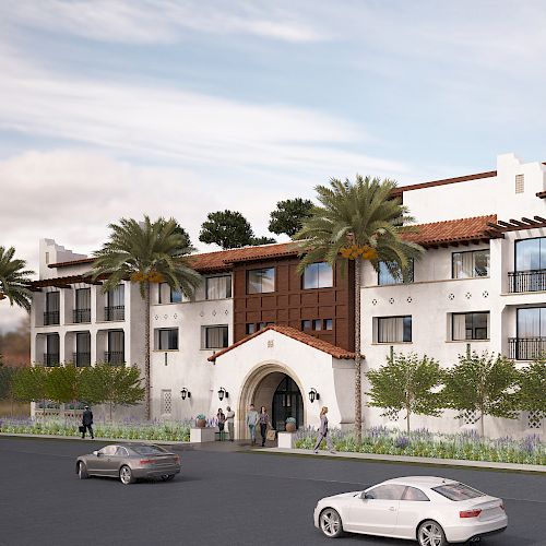 The image shows a Mediterranean-style building with palm trees, balconies, and large windows, located on a street with parked cars and pedestrians.