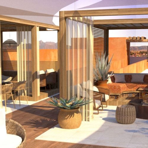 An outdoor lounge area with wood cabanas, wicker chairs, tables, and desert plants. Decor features natural tones, cozy seating, and warm lighting.